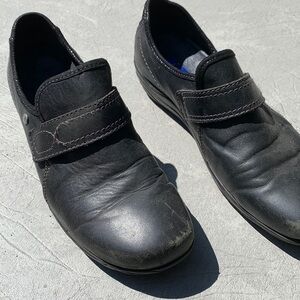 Black leather Wolky walking shoes.